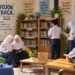Ilustrasi kegiatan pojok baca, memperlihatkan siswa membaca dan memanfaatkan koleksi buku secara bersama dalam suasana belajar yang nyaman dan harmonis. (Sumber: AI oleh ChatGPT, 2026)