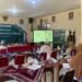 Merangkul Keheningan dalam Ibadah: Pelatihan Sholat dan Wudhu isyarat di SLB-B 16 Merangkul keheningan dalam ibadah: Pelatihan Sholat dan Wudhu isyarat di SLB-B Sleman, 19 Agustus 2026- Dalam rangka memperluas akses Pendidikan yang inklusif bagi murid berkebutuhan khusus, SLB-B Wiyata Dharma 1 Sleman Bersama Universitas Negeri Yogyakarta dan Pondok Pesantren Darul Ashom mengadakan pelatihan Sholat dan Wudhu dengan Bahasa isyarat. Acara ini diikuti oleh para guru SLB-B Wiyata Dharma 1 Sleman dan sejumlah Mahasiswa Praktik Kependidikan (PK) dari Program Pendidikan Luar Biasa UNY. Pelatihan di laksanakan SLB-B Wiyata Dharma 1 Sleman pada tanggal 19 Agustus 2026 hari Rabu, guna untuk membekali para pendidik dengan kemampuan mendampingi murid yang memiliki hambatan pendengaran. Kegiatan ini berkontribusi nyata terhadap SDG 4 (Pendidikan Berkualitas), khususnya target 4,4 yang menekankan penghapusan kesenjangan dan jaminan akses Pendidikan yang setara bagi kelompok disabilitas, dalam hal ini melalui peningkatan kapasitas guru sebagai ujung tombak Pendidikan inklusif. Selain itu, kegiatan ini juga sejalan dengan SDG 10 (Berkurangnya kesenjangan), sebab memastikan bahwa hak menjalankan ibadah dapat difasilitasi secara setara oleh tenaga pendidik yang kompeten dan memahami kebutuhan komunikasi murid hambatan pendengaran. Rangkaian acara diawali dengan penyampaian materi seputar huruf hijaiyah dan bacaan Al-quran menggunakan Bahasa isyarat dilanjutkan kembali dengan materi tata cara wudhu dan sholat menggunakan Bahasa isyarat, kemudia dilanjutkan dengan sesi praktik yang langsung dibimbing oleh Kiyai Abu Kahfi. Para peserta dilatih mengenali dan memperagakan gerakan isyarat untuk setiap bacaan serta rukun dalam sholat, agar dapat diterapkan secara berkelanjutan saat mendampingi murid hambatan pendengaran belajar dan beribadah disekolah. Mahasiswa turut hadir mengikuti rangkaian perlatihan sebagai bagian dari proses belajar, sekaligus mempersiapkan diri untuk turut mendukung guru dalam pendampingan ibadah murid kedepan nya. Manfaat pelatihan ini dirasakan terutama oleh para guru, yang kini memiliki bekal keterampilan komunikasi isyarat dalam konteks keagamaan yang sebelumnya jarang tersedia secara formal. Dengan bekal ini, guru dapat mendampingi siswa beribadah dengan lebih percaya diri dan tepat sasaran. Bagi murid, dampaknya akan terlihat pada kualitas pendampingan ibadah yang lebih baik dan konsisten di sekolah. Bagi mahasiswa PK, kegiatan ini menjadi pengalaman belajar berharga mengenai pentingnya kompetensi guru dalam Pendidikan inklusif. Secara kelembagaan, pelatihan ini memperkuat komitmen SLB-B Wiyata Dharma 1 Sleman dalam mencetak tenaga pendidik yang siap menghadirkan layanan Pendidikan yang ramah dan setara bagi penyandang disabilitas. Harapanya, pelatihan bagi guru semacam ini dapat terus dilaksanakan secara berkala dan diperluas cakupan materinya, tidak terbatas pada praktik Sholat dan Wudhu saja, tetapi juga mencakup aspek keagamaan lain yang relevan bagi murid hambatan pendengaran. Investasi pada kompetensi guru melalui kolaborasi dengan perguruan tinggi dan Lembaga keagamaan diharapkan menjadi fondasi berkelanjutan bagi Pendidikan inklusif di SLB.