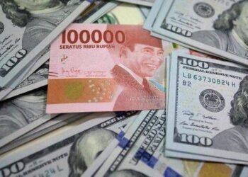 Ilustrasi Rupiah dan Dollar AS